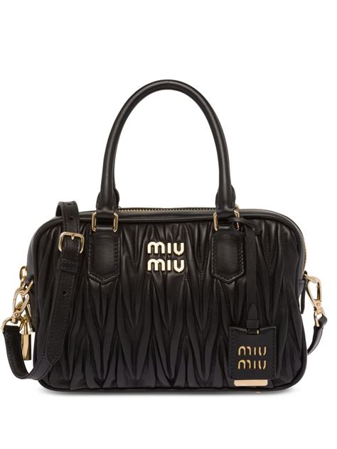 miu miu leather fur pouch|farfetch miu michael bags.